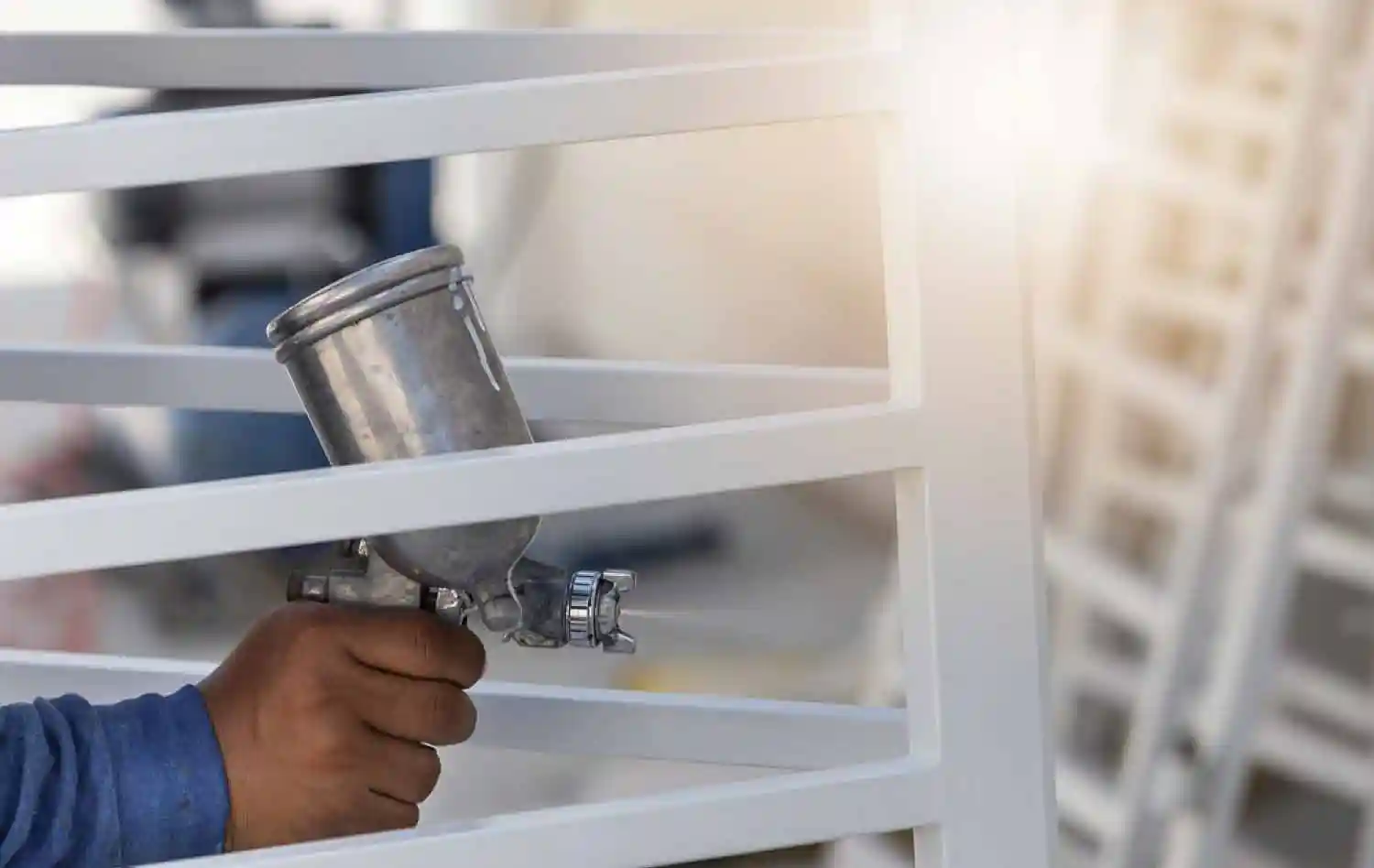 Spraying anticorrosive coating on metal — Raykem anticorrosive pigment supplier UAE